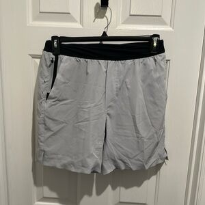 Mens Ten Thousand Interval Shorts. 7” inseam with liners. Size Small.